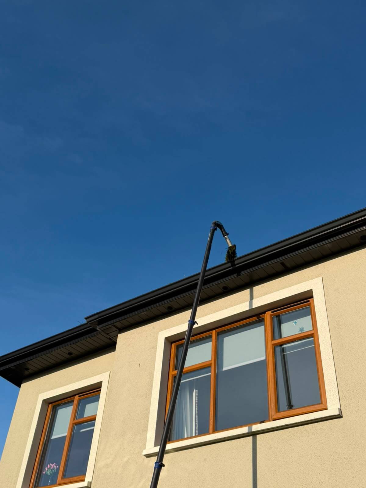 gutter vac cleaning out gutters